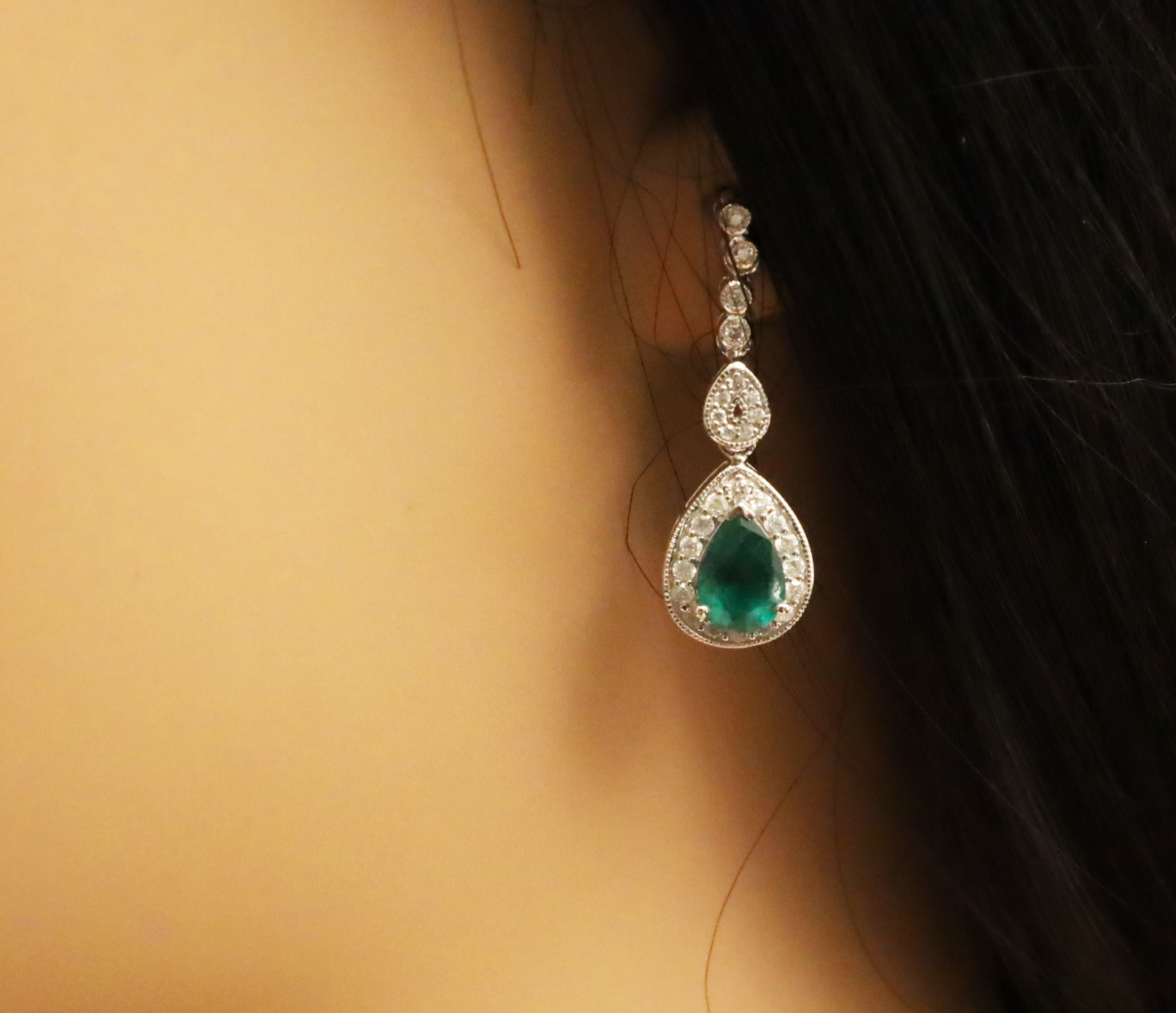 Appraisal: PAIR OF K EMERALD DIAMOND DANGLE EARRINGS Pair of K