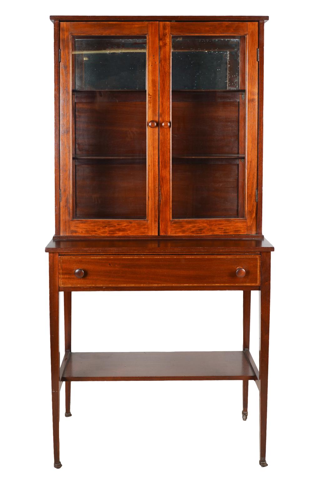 Appraisal: MAHOGANY GLASS VITRINE CABINETthe interior with partially mirrored back inches