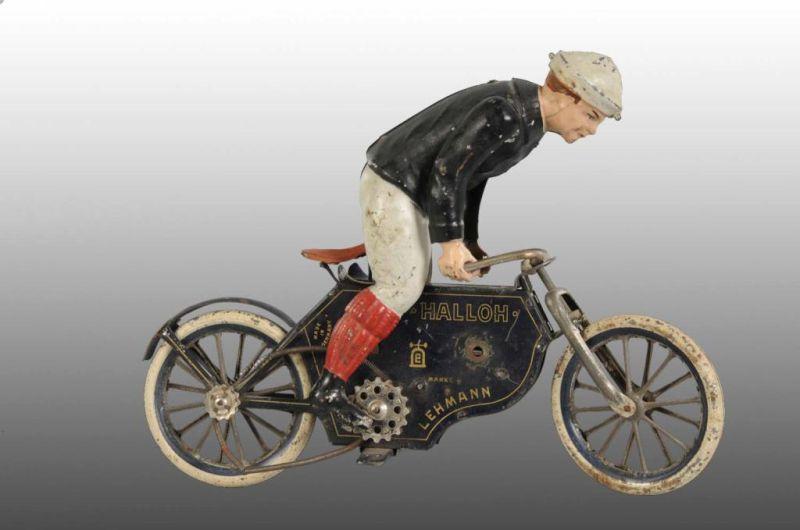 Appraisal: Tin Lehmann Halloh Motorcycle Wind-Up Toy Description German Handpainted rider