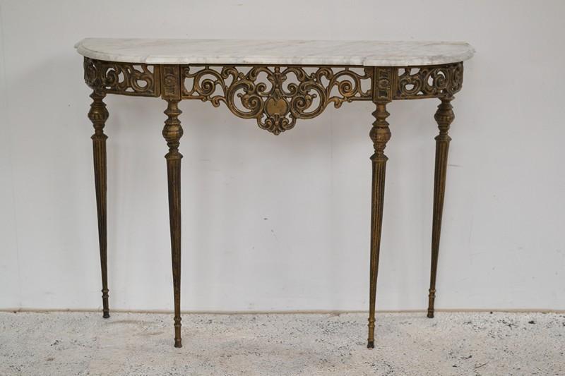 Appraisal: A GILT MARBLE TOPPED CONSOLE WITH CAST IRON BASE A