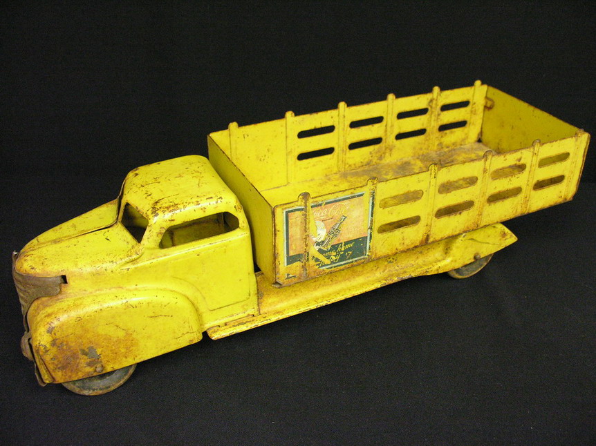 Appraisal: MARX STAKE TRUCK COKE ADV SPRITE BOY Pressed steel Size