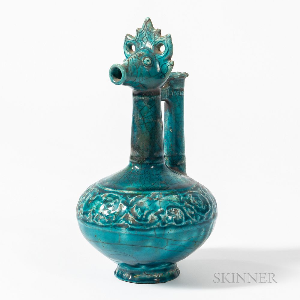 Appraisal: Kashan Turquoise-glazed Animal-headed Ewer Kashan Turquoise-glazed Animal-headed Ewer Persia possibly