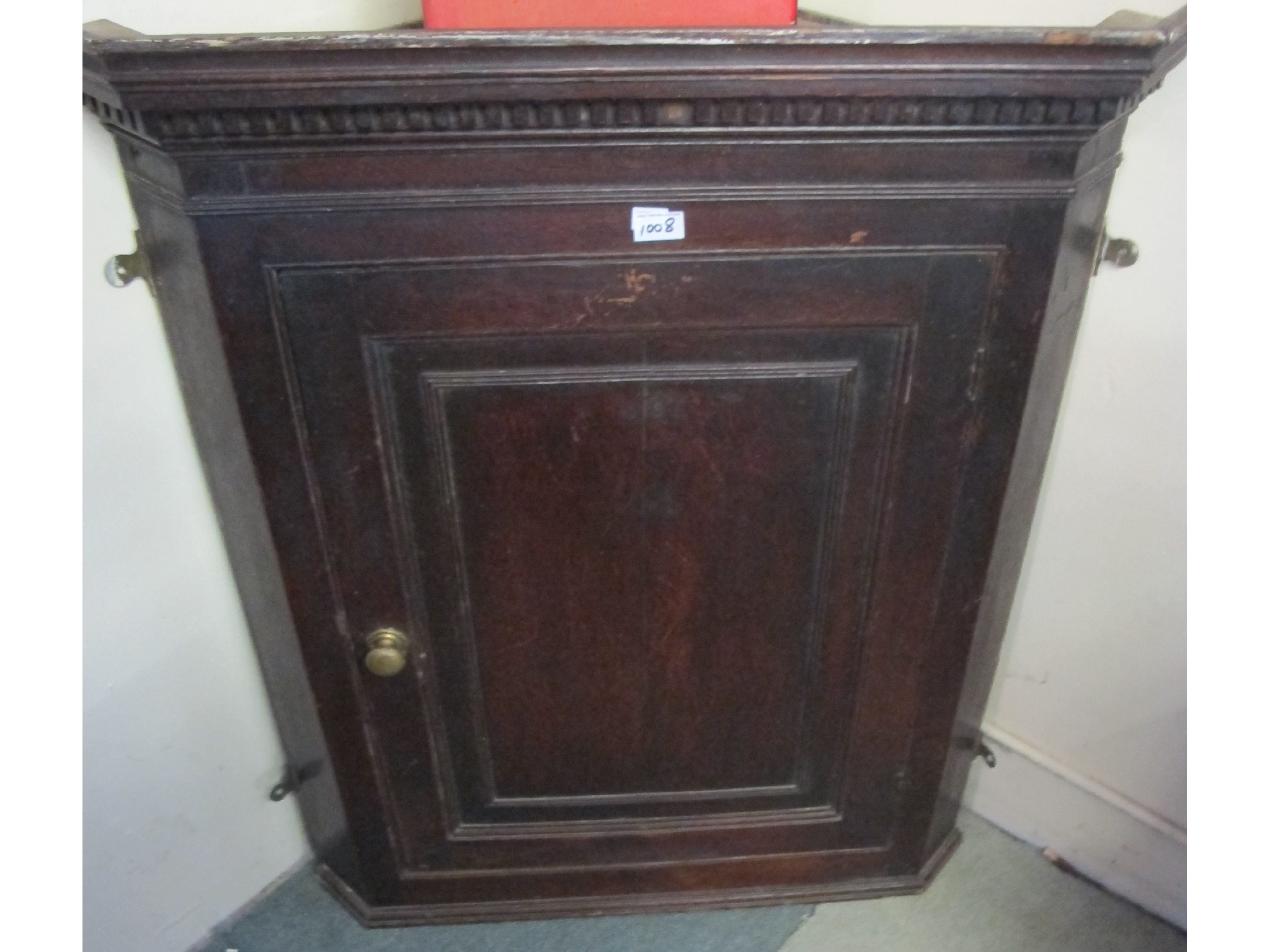 Appraisal: A mahogany wall hanging corner cabinet