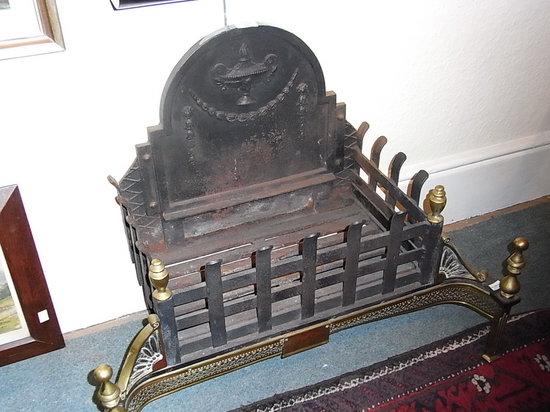 Appraisal: AN ADAM STYLE BRASS AND IRON FIRE BASKET with urn