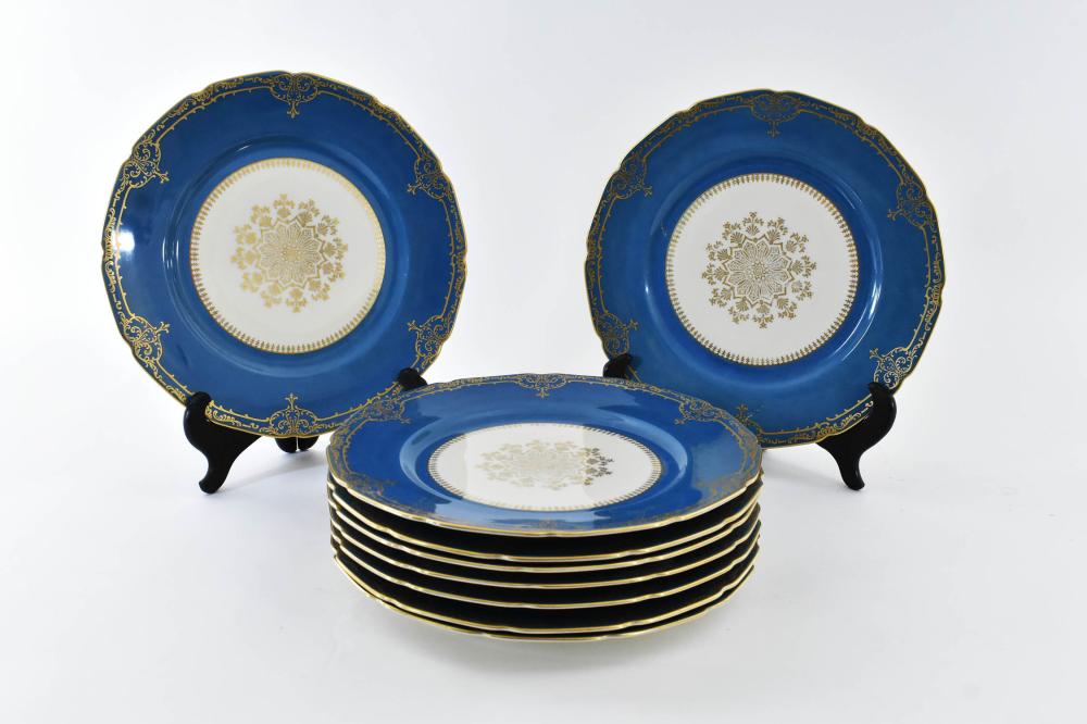 Appraisal: NINE GERMAN PARCEL GILT PORCELAIN SERVICE PLATESCirca Marked Continental Ivory