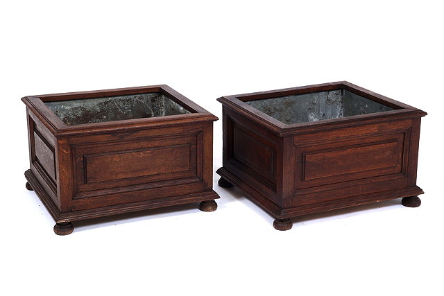 Appraisal: A PAIR OF OLD OAK TIN LINED JARDINIERES each with