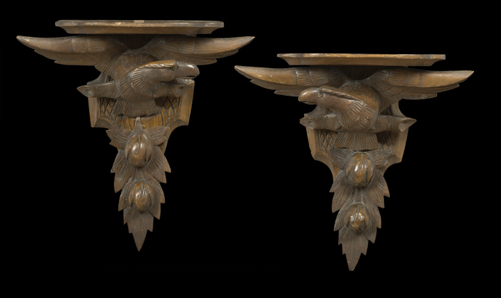 Appraisal: Large Pair of Schwarzwald Carved and Stained Mixed Wood Bracket