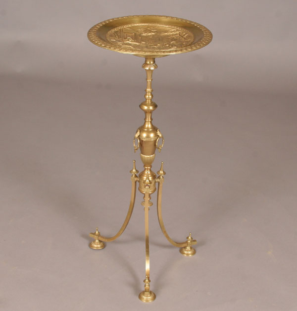 Appraisal: Solid brass card stand curved legs circular tray with embossed