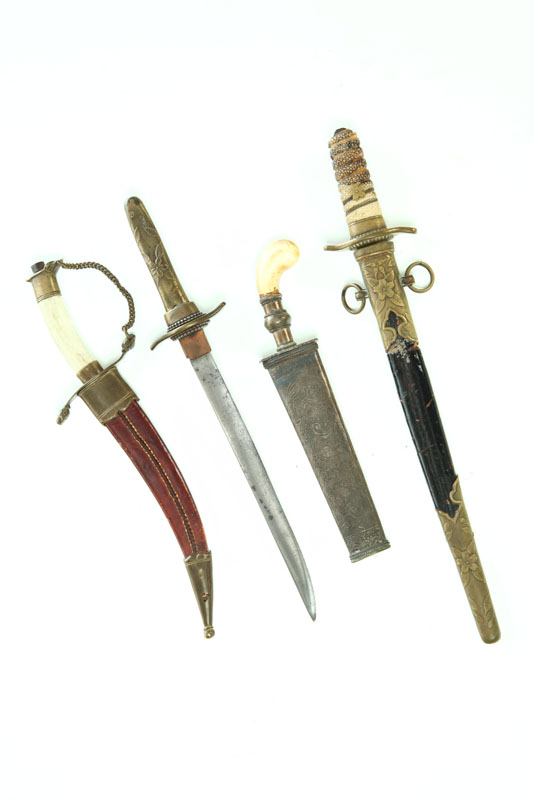 Appraisal: FOUR KNIVES Eastern and European th century Middle Eastern sash