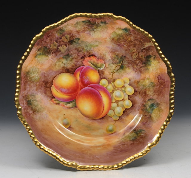 Appraisal: A ROYAL WORCESTER CABINET PLATE painted with fruit within a