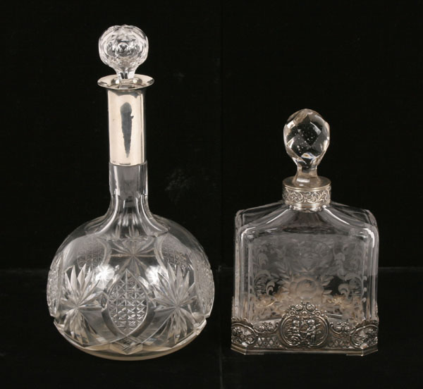 Appraisal: Lot of two German sterling mounted cut glass decanters Bulbous