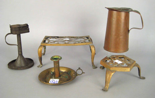 Appraisal: Two brass trivets together with a chamberstick copper pitcher and