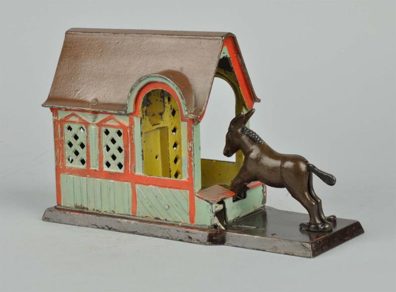 Appraisal: Mule Entering Barn Mechanical Bank Manufactured by J E Stevens