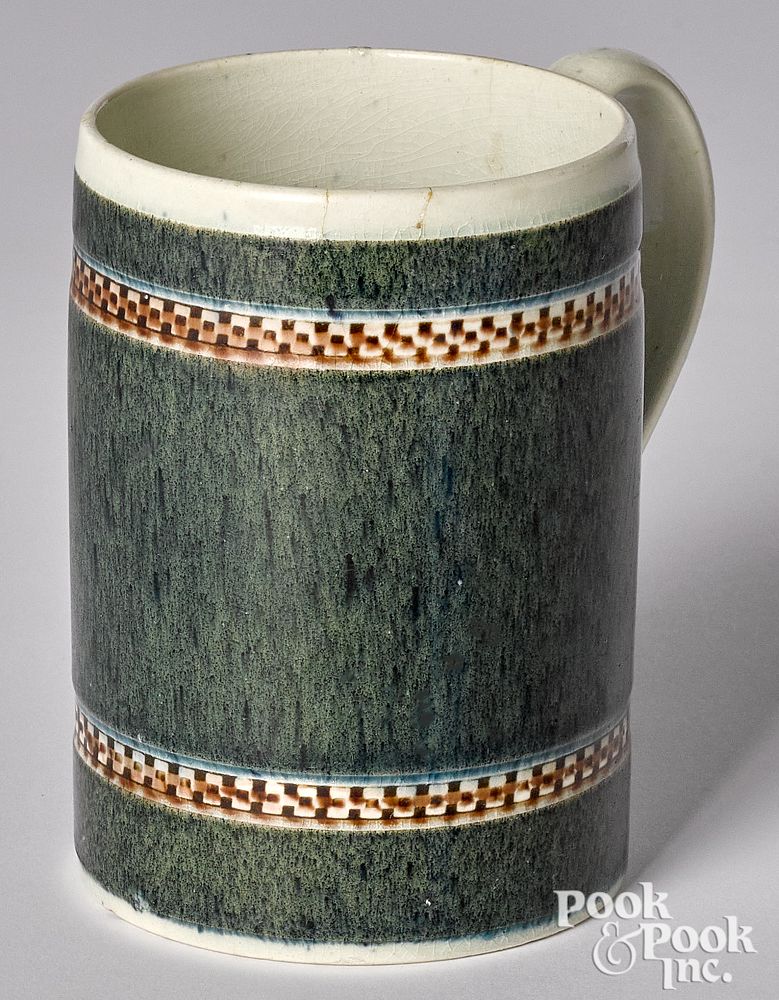 Appraisal: Mocha mug Mocha mug with speckled green glaze h Provenance