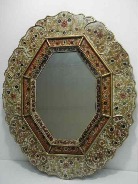 Appraisal: Peruvian reverse painted wall mirror Gilt edges with floral eglomise