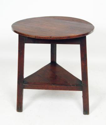 Appraisal: AN OAK CRICKET TABLE early th century the circular plank