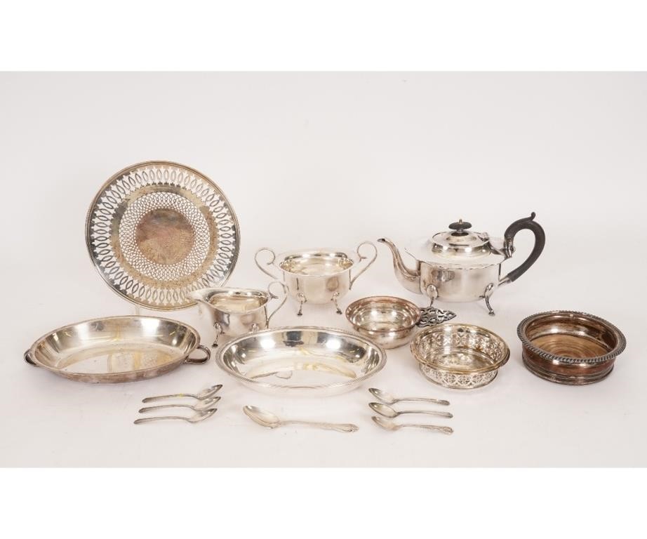 Appraisal: Silverplate tableware to include a three-piece tea service coaster etc