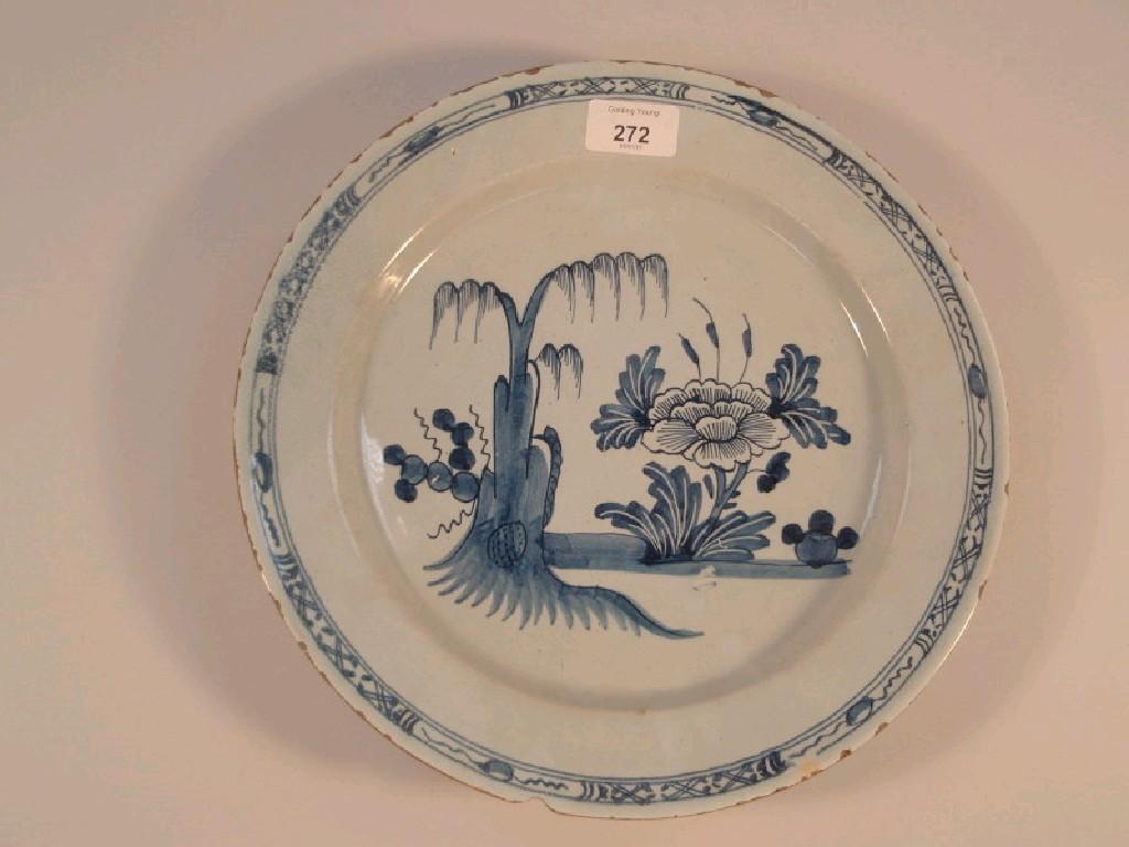 Appraisal: An thC Dutch Delft saucer dish with floral central field