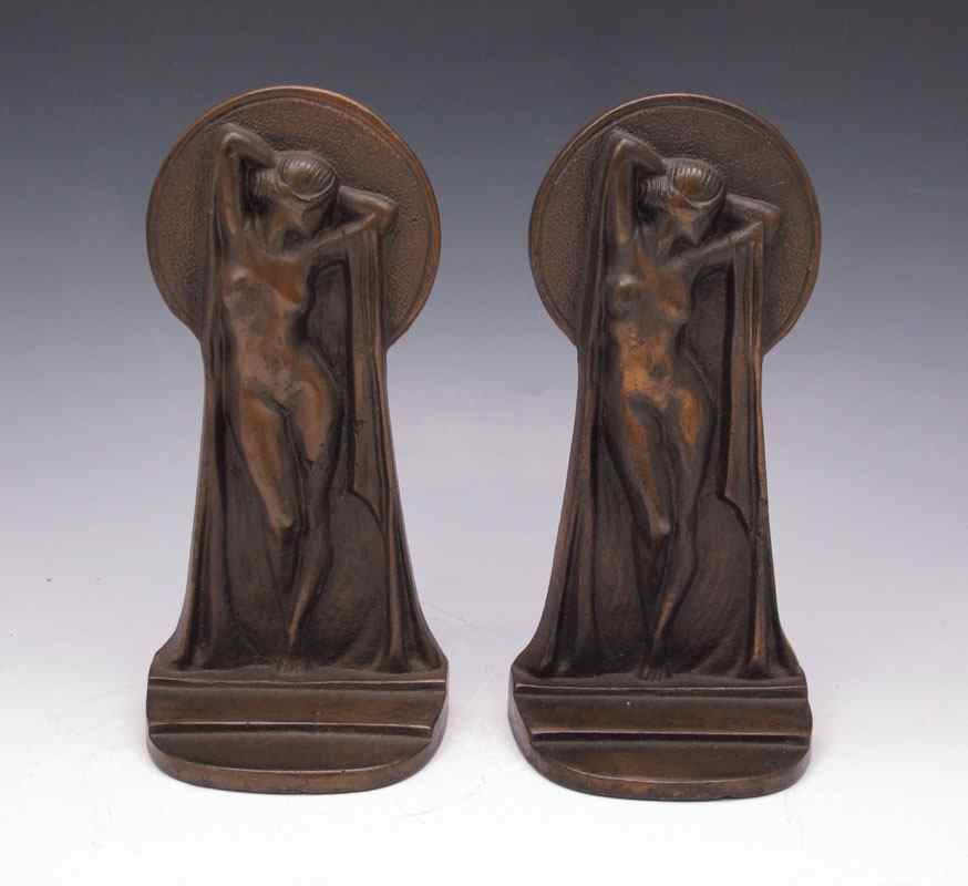 Appraisal: ART DECO CAST IRON FIGURAL NUDE BOOKENDS '' tall