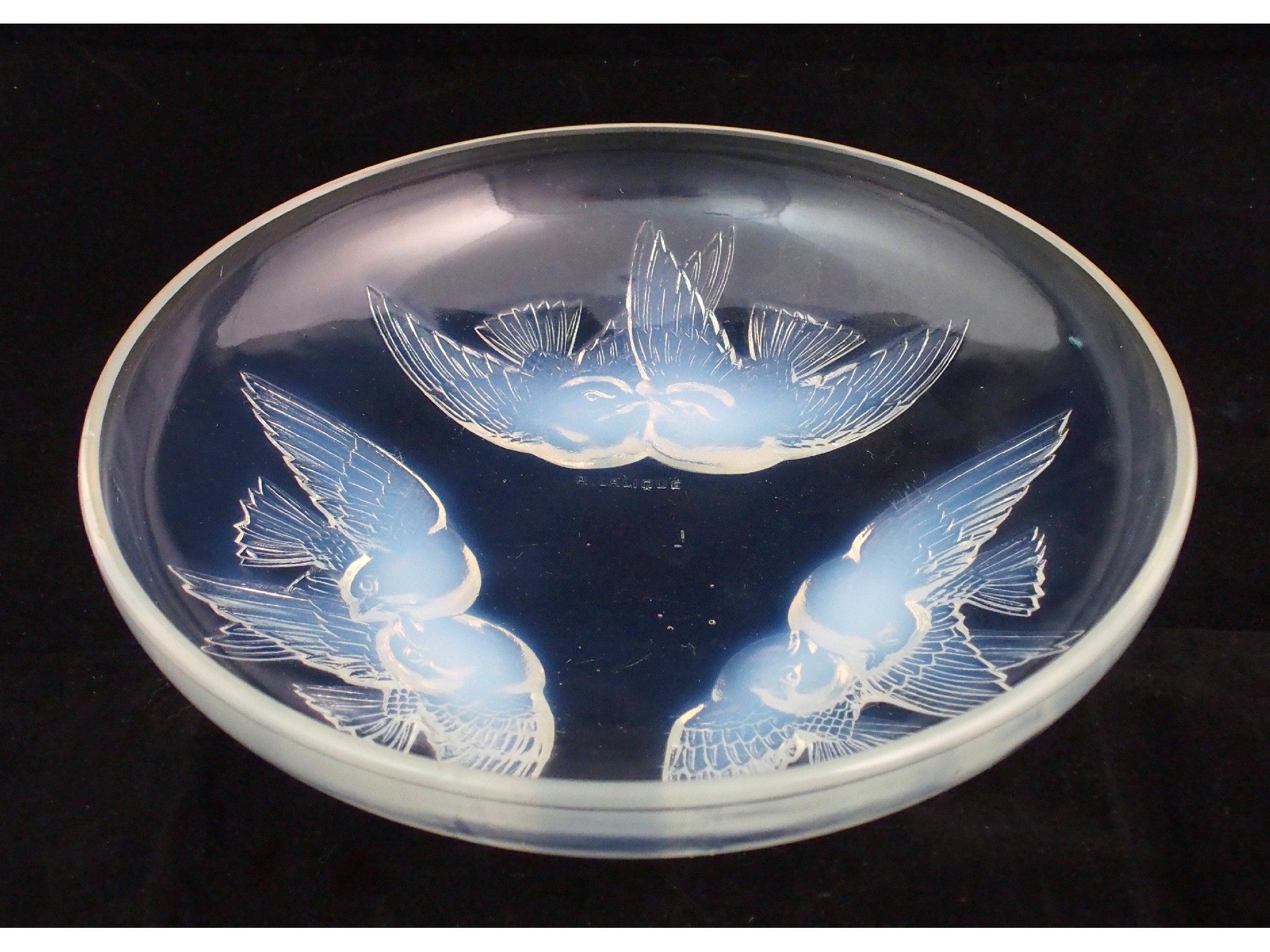 Appraisal: A Rene Lalique Nonnettes pattern moulded opalescent glass bowlcirca three