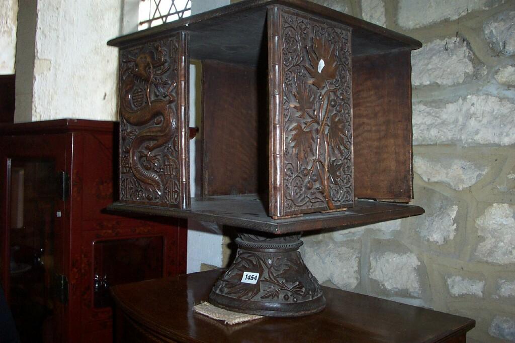 Appraisal: A th century Chinese hardwood table top revolving bookcase with