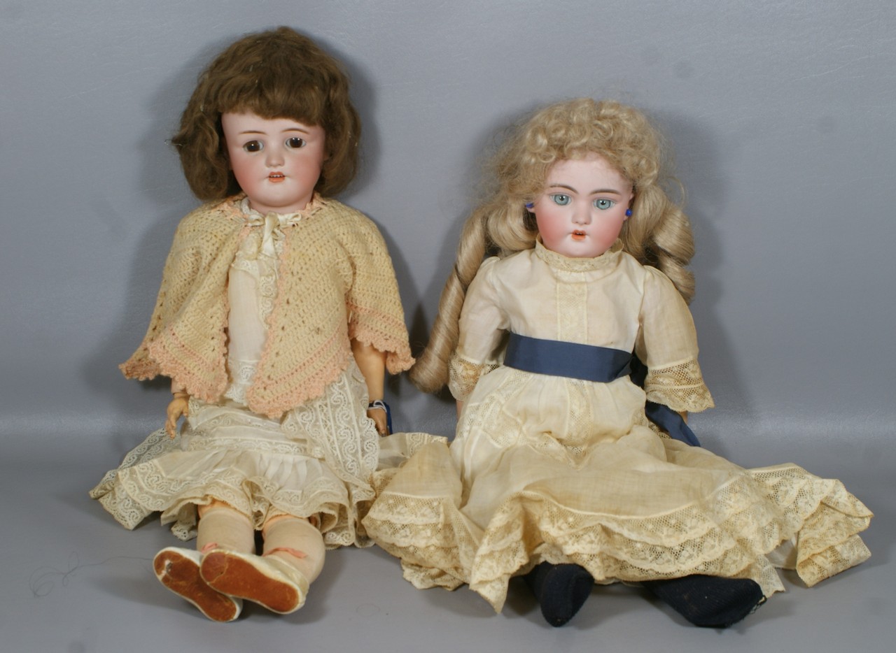 Appraisal: German Bisque Head Dolls larger incised Simon and Halbig with