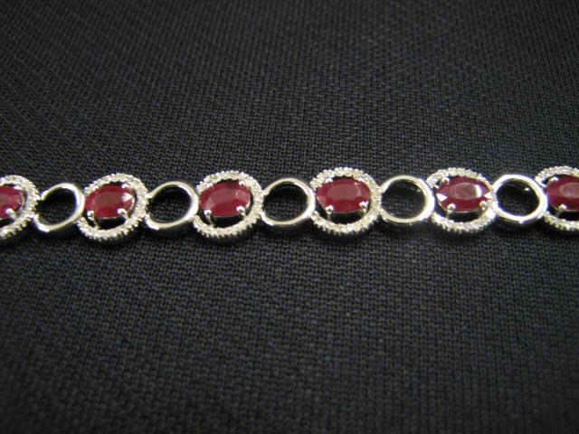 Appraisal: Ruby Diamond Bracelet oval gems totaling carats and diamonds totaling