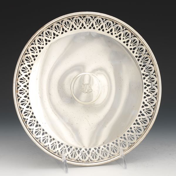 Appraisal: TIFFANY CO STERLING FOOTED PLATE x Reticulated rim monogram to