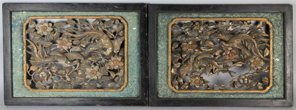 Appraisal: PAIR OF CHINESE CARVED WOOD AND PARCEL GILDED PANELS each