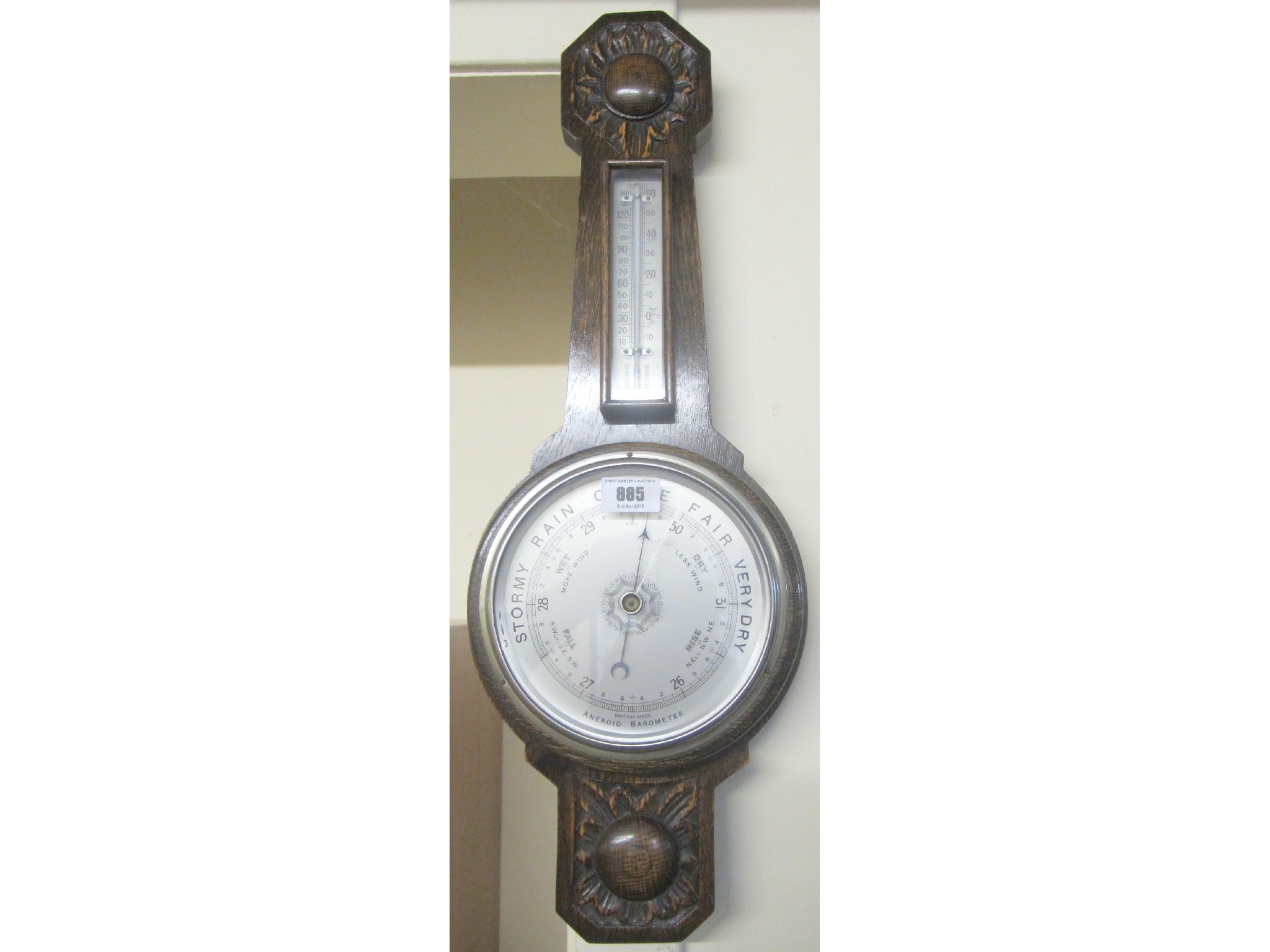 Appraisal: An oak British made aneroid barometer and thermometer