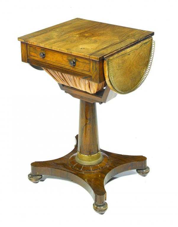 Appraisal: A GEORGE IV ROSEWOOD WORK TABLE the semi-circular leaves with