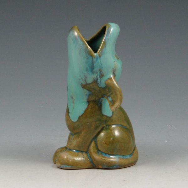 Appraisal: Shearwater howling dog figurine in flowing blue over green gloss