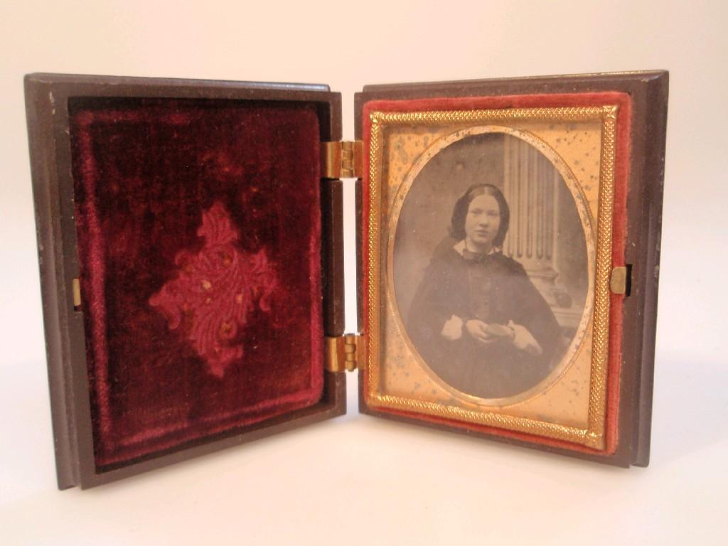 Appraisal: A Victorian daguerreotype portrait photograph of a lady and a