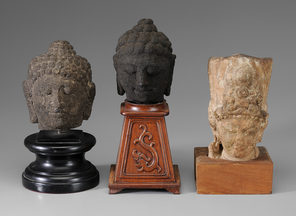 Appraisal: Three Carved Stone Heads Indonesian th century or earlier two