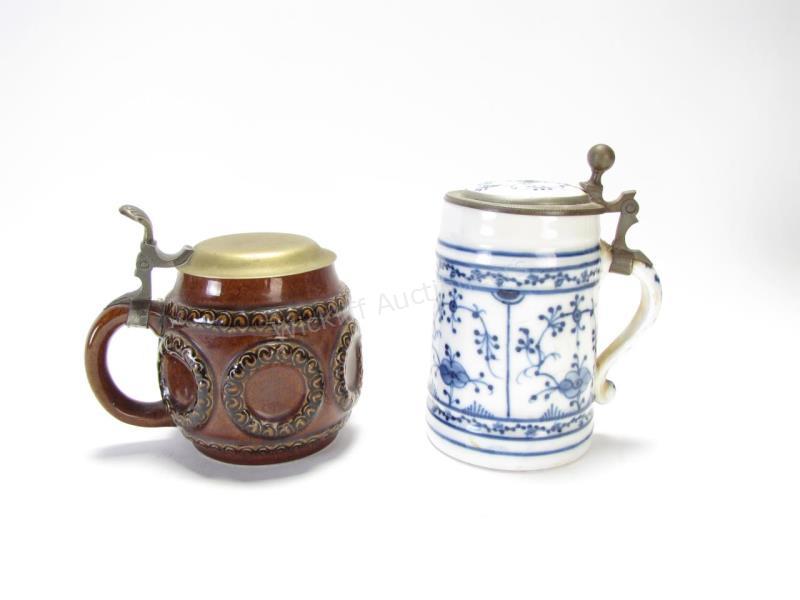 Appraisal: Two Porcelain Steins L Dumler and Breiden stein with brown