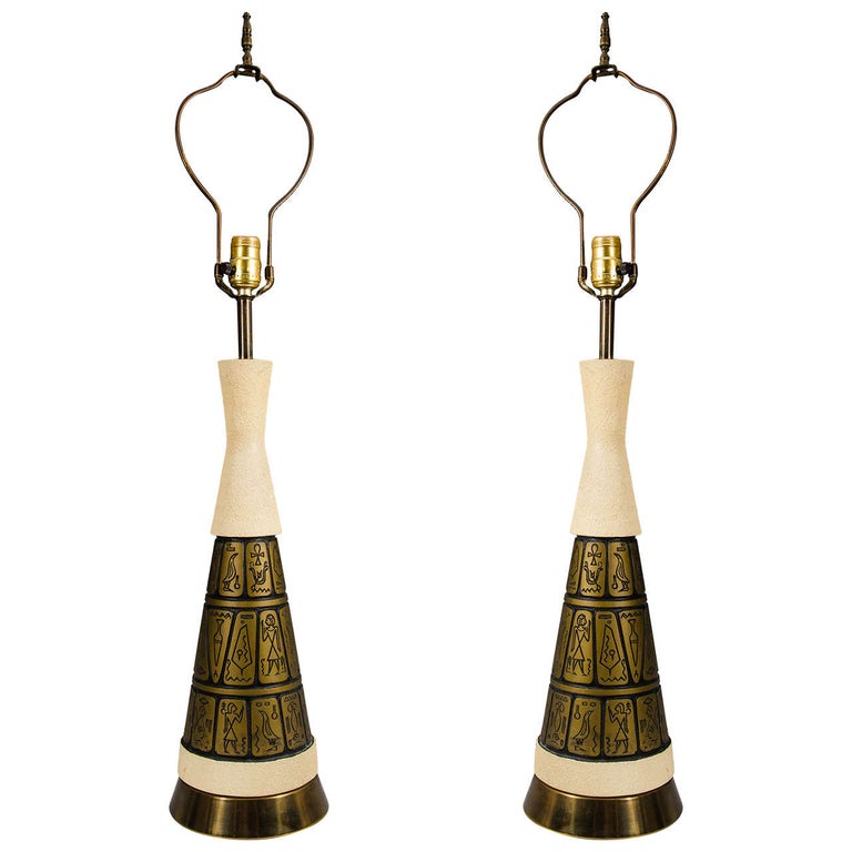 Appraisal: TABLE LAMPS DECORATED WITH EGYPTIAN HIEROGLYPHS Pair of Table Lamps