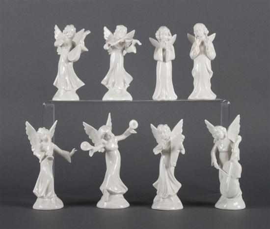 Appraisal: Eight Dresden white porcelain angels th century six-piece angel band