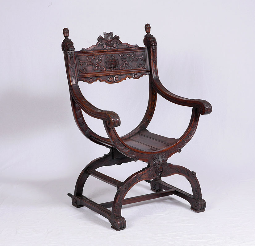 Appraisal: CARVED ITALIAN RENAISSANCE REVIVAL SAVONAROLA CHAIR Carved all over back