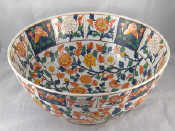 Appraisal: A large Chinese ceramic bowl with butterflies and floral decoration