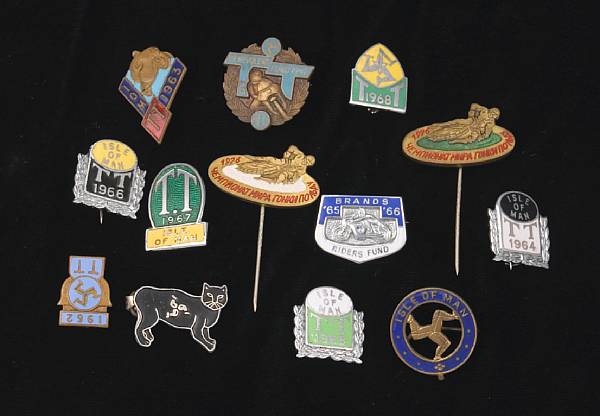 Appraisal: A collection of thirteen motorcycle stick and lapel pins including