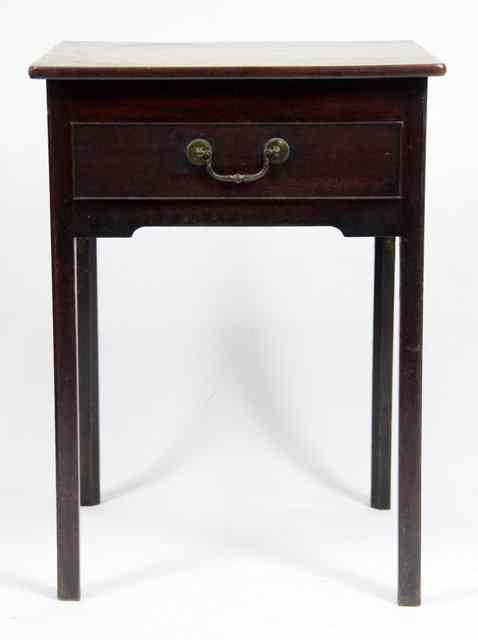 Appraisal: A mahogany bedside table fitted a drawer to the frieze