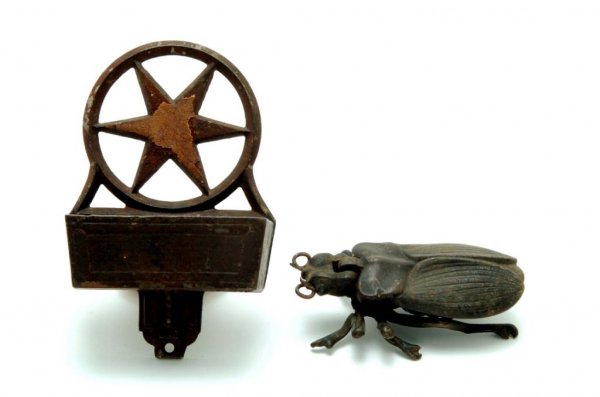 Appraisal: Two cast iron figural match safes One insect with articulated