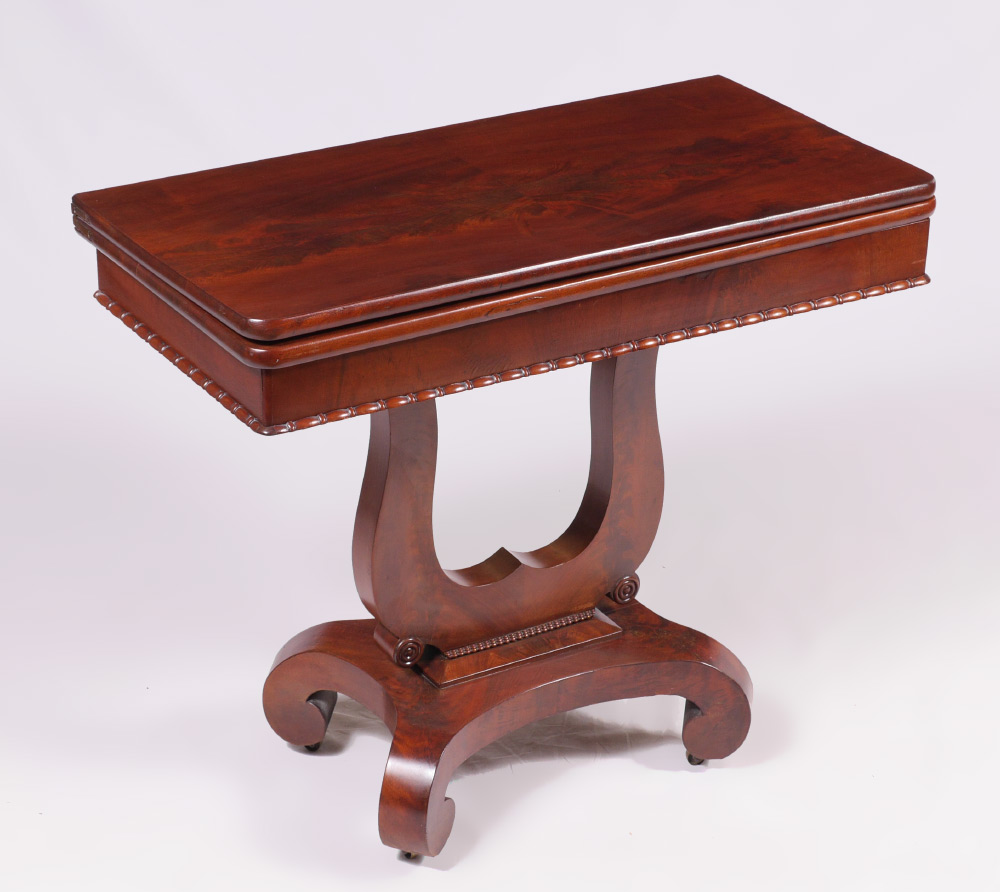 Appraisal: EMPIRE MAHOGANY LYRE BASE GAME TABLE Hinged rotating top lyre