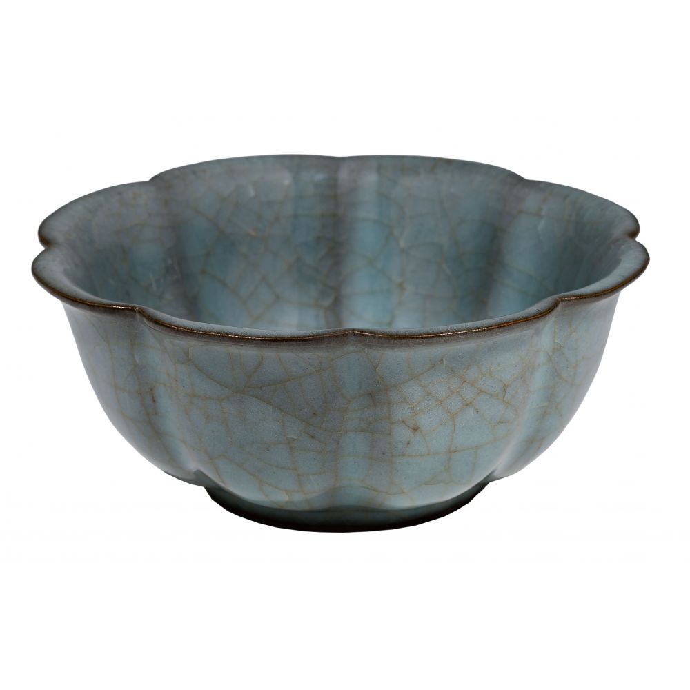 Appraisal: CHINESE CELADON CRACKLE GLAZED FLORIFORM BOWLGuan ware style having darkening