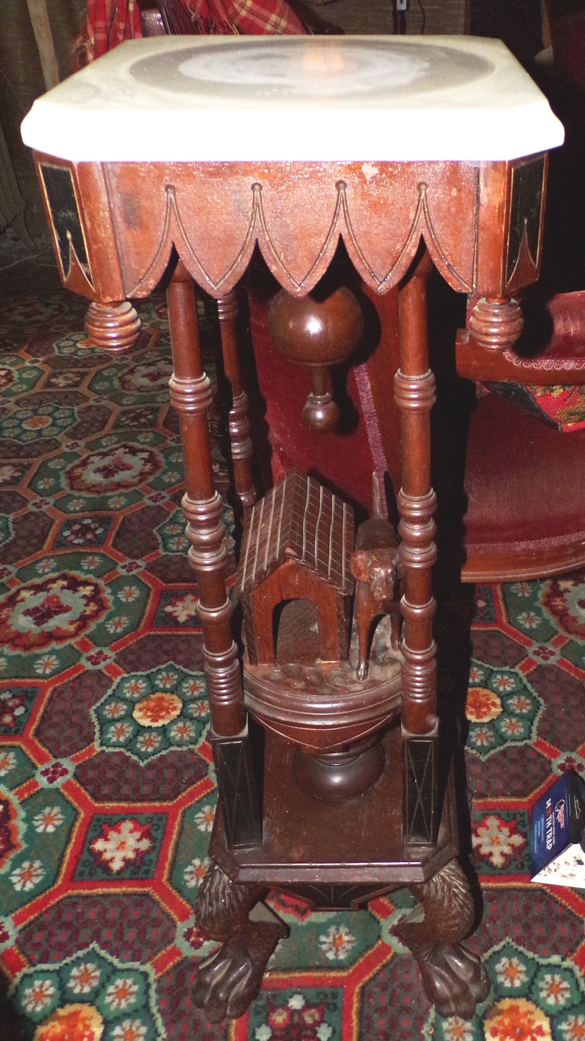 Appraisal: Marble top Victorian plant stand with central shelf ornamented with