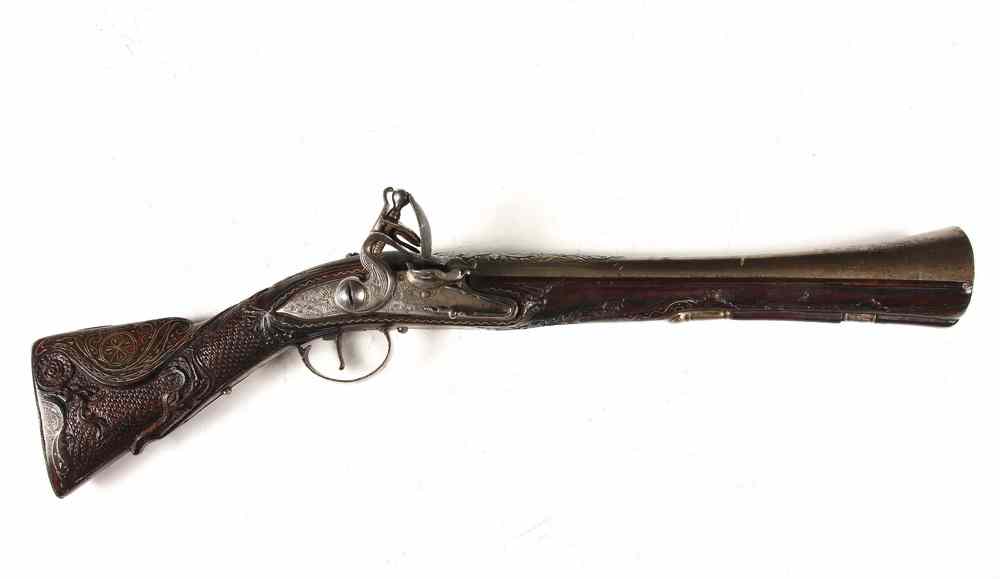 Appraisal: REPLICA COACHMAN'S BLUNDERBUSS - Ornate flintlock with profusely carved and