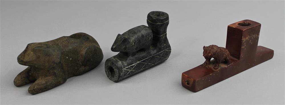 Appraisal: THREE ANIMAL EFFIGY PIPES th C reproductions one bear has