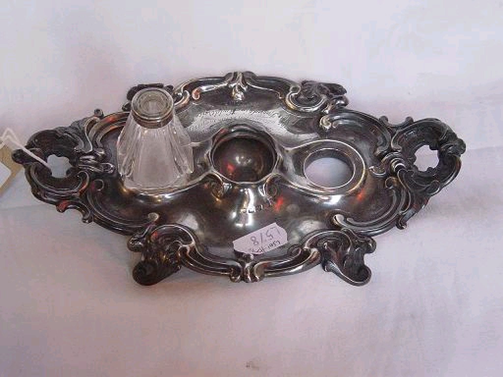 Appraisal: A Victorian silver standish in the Rococo style with relief