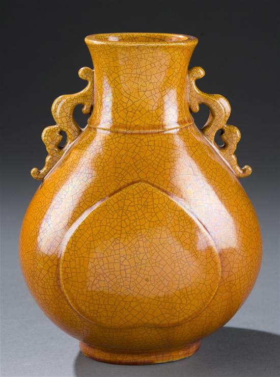 Appraisal: Chinese porcelain crackleware vase Rust glazed double-eared vase of baluster