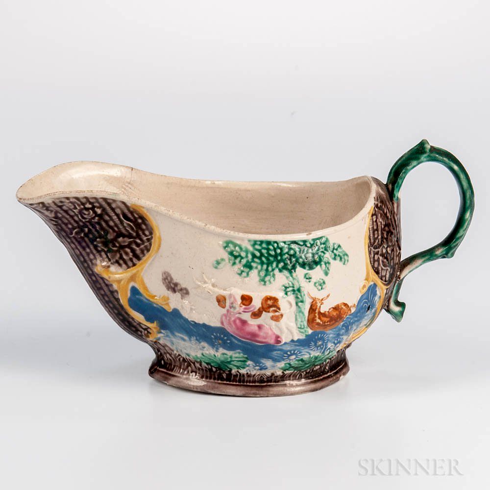 Appraisal: Staffordshire White Salt-glazed Stoneware Landskip Sauceboat Staffordshire White Salt-glazed Stoneware